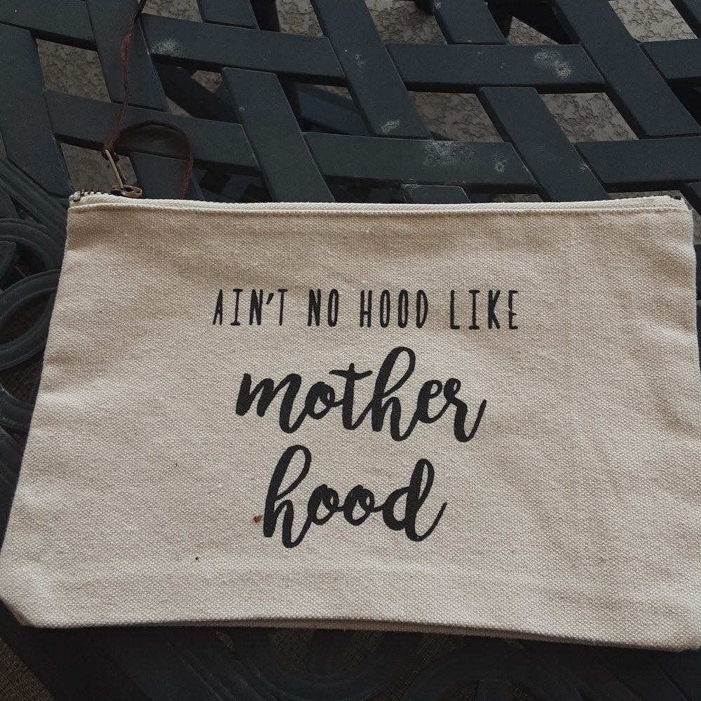 Canvas makeup bag 'Ain't no hood like Motherhood' saying on front